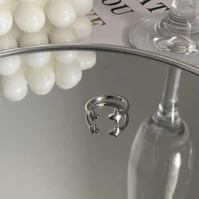 Gyönyörű cirkonkeresztes aszterizmus gyűrű